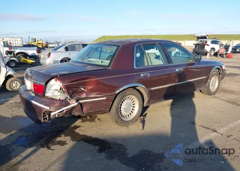 2001 Mercury Grand Marquis Ls из США, поврежденный, VIN 2MEFM75W01X688393